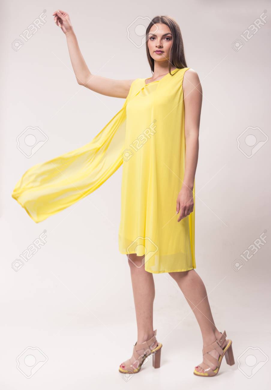 yellow dress and white shoes