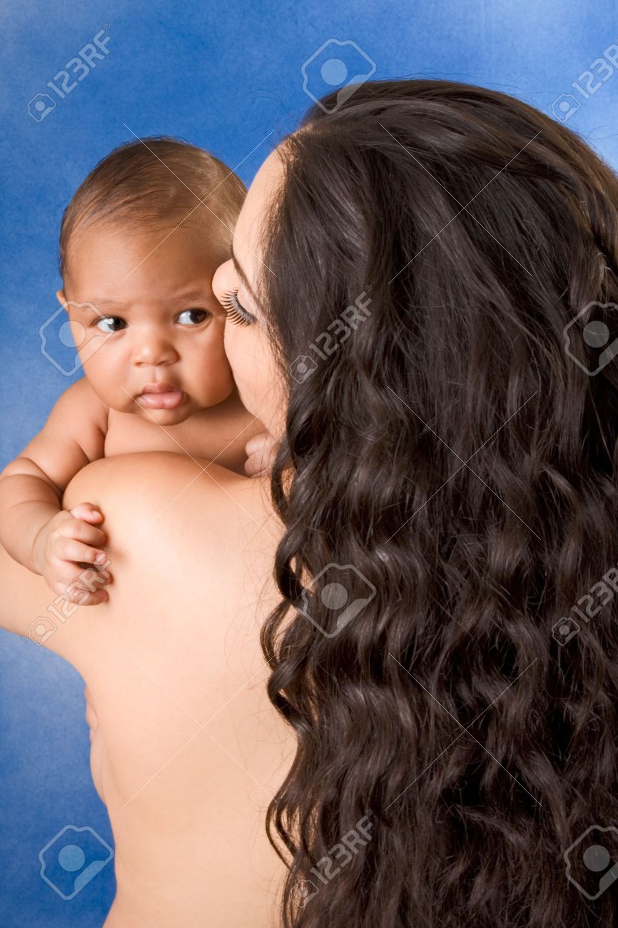 Nude Hispanic Mom Holding Her Biracial Mix Of Hispanic And African American  Baby Son Against Blue Background Stock Photo, Picture and Royalty Free  Image. Image 4602226., image size:866x1300