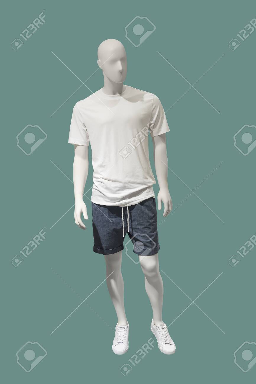 Full Length Male Mannequin Dressed In White T Shirt And Blue Shorts Isolated On Green Background No Brand Names Or Copyright Objects Fotos Retratos Imagenes Y Fotografia De Archivo Libres De Derecho Image