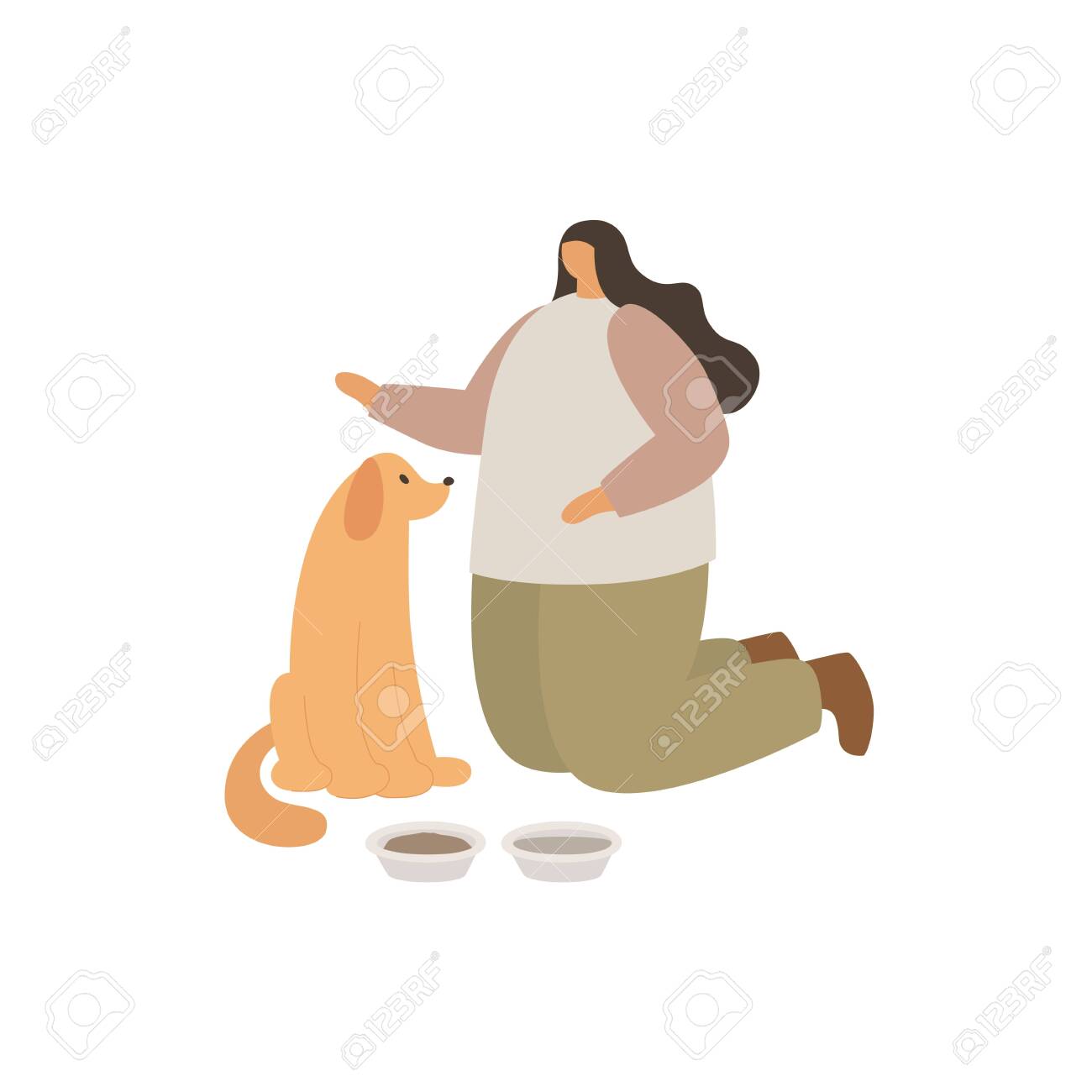 A young girl feeds her dog. Love to the animals. Training and education of pets. - 151407073 A young girl feeds her dog. Love to the animals. Training and education of pets. - 151407073