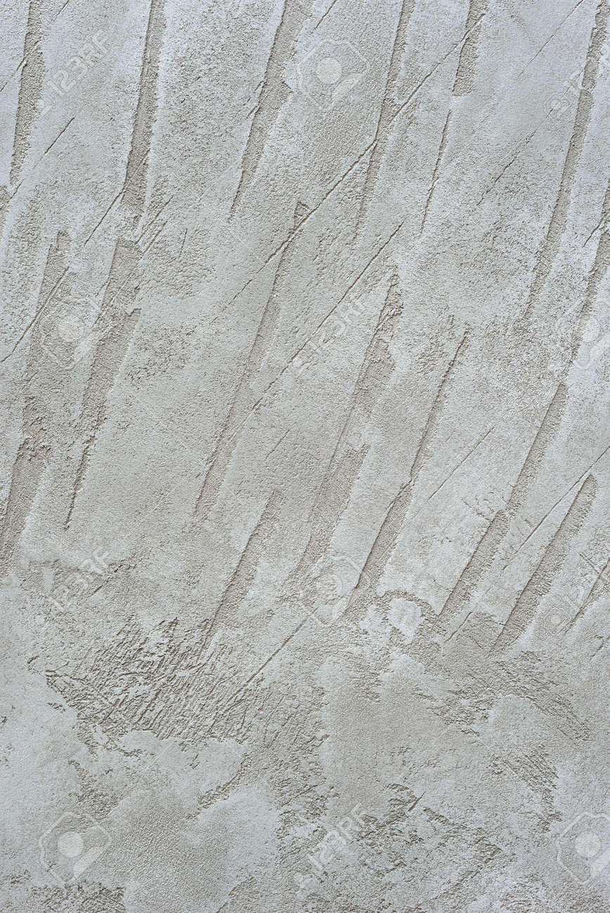 Textured vertical background. Decorative gray plaster imitating an old concrete wall. Exterior cement facade finish. - 152170003 Textured vertical background. Decorative gray plaster imitating an old concrete wall. Exterior cement facade finish. - 152170003