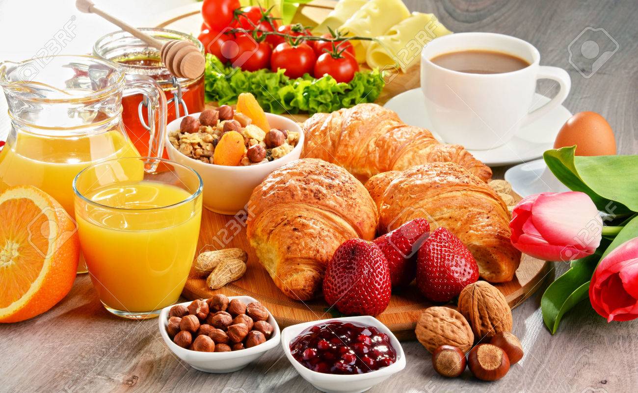Breakfast consisting of croissants, coffee, fruits, orange juice, coffee and jam. Balanced diet. - 54722151 Breakfast consisting of croissants, coffee, fruits, orange juice, coffee and jam. Balanced diet. - 54722151