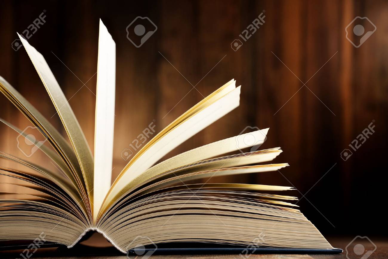 Composition with hardcover book on the table. - 61572872 Composition with hardcover book on the table. - 61572872