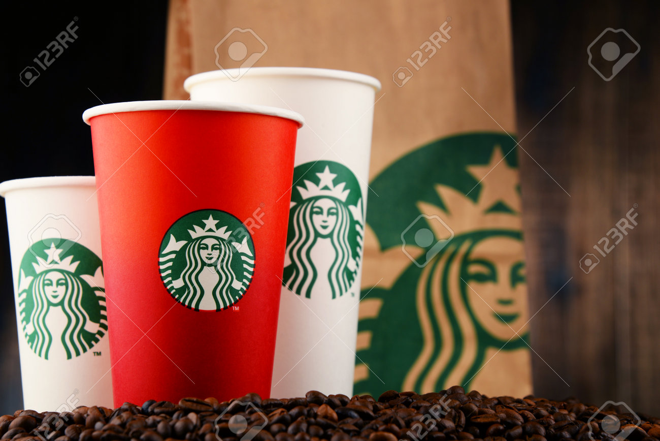 POZNAN, POLAND - DEC 15, 2016: Starbucks, coffee company and coffeehouse chain, founded in Seattle, Wa. USA, in 1971; now the largest business of this kind in the world operates 23,450 locations - 69047476 POZNAN, POLAND - DEC 15, 2016: Starbucks, coffee company and coffeehouse chain, founded in Seattle, Wa. USA, in 1971; now the largest business of this kind in the world operates 23,450 locations - 69047476