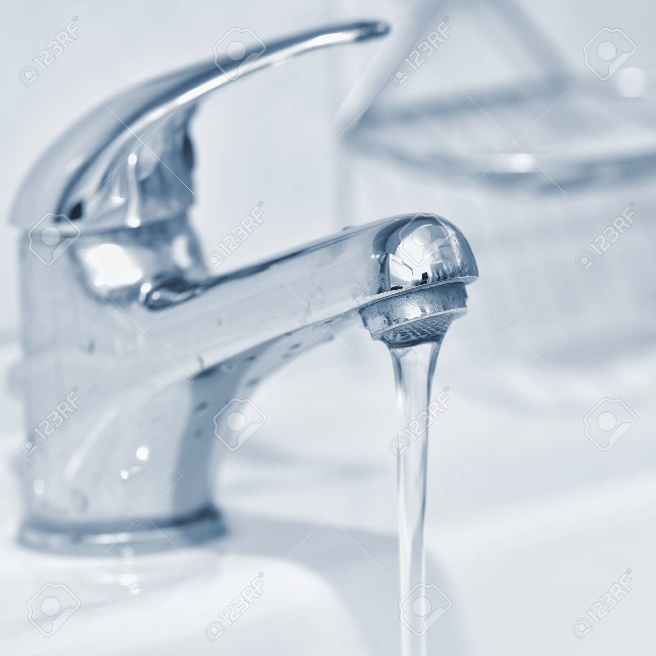 Faucet With Running Water In Bathroom Interior Stock Photo, Picture And Royalty Free Image. Image 56578234. Faucet With Running Water In Bathroom Interior Stock Photo, Picture And Royalty Free Image. Image 56578234.