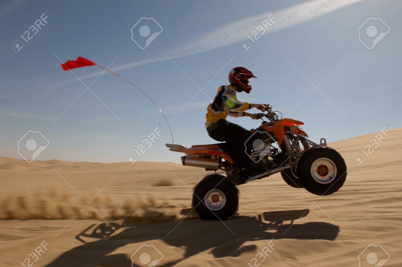 how to wheelie a quad how to wheelie a quad
