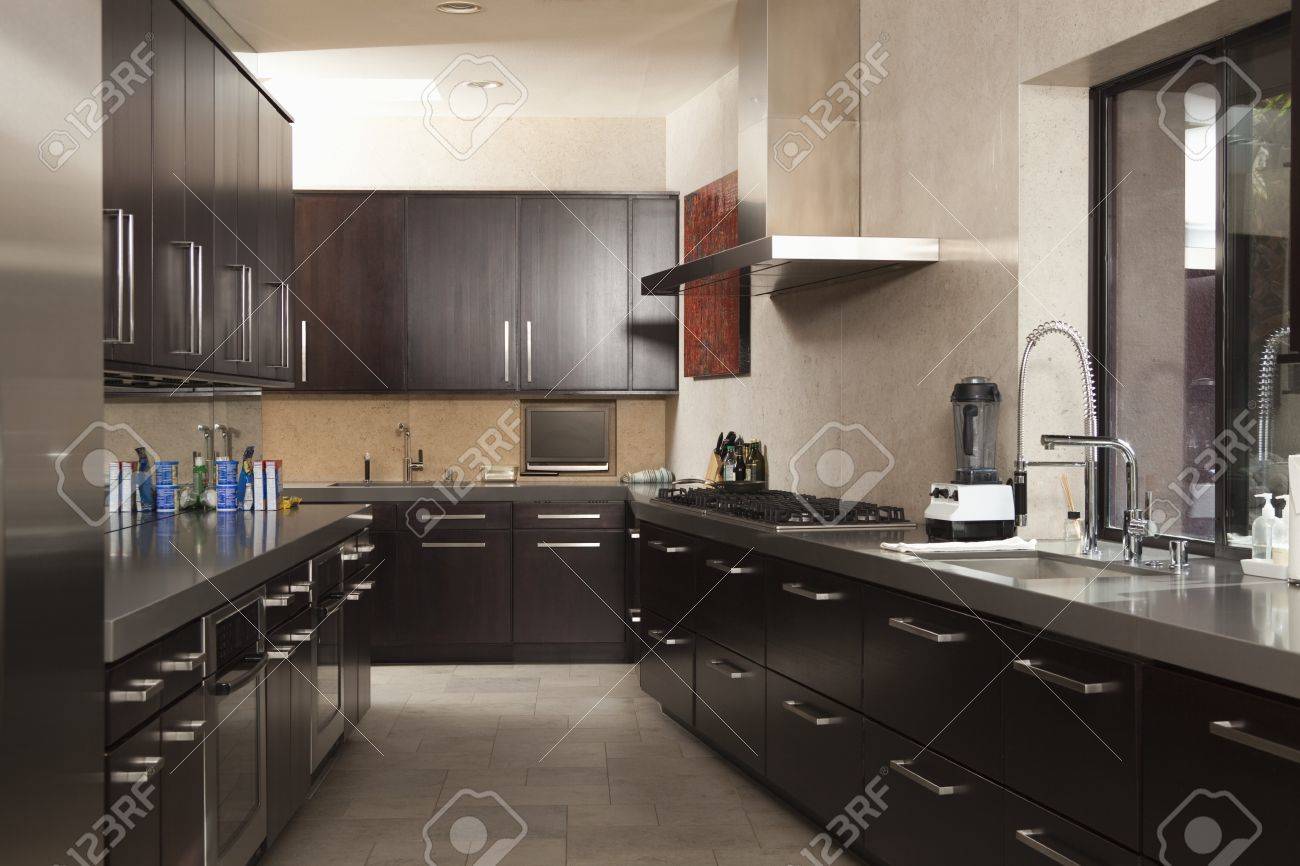 Dark Wood Galley Kitchen Stock Photo, Picture And Royalty Free Dark Wood Galley Kitchen Stock Photo, Picture And Royalty Free