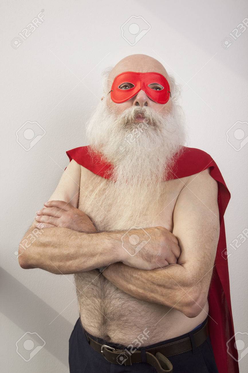 Mit Nacktem Oberkörper Älterer Mann In Superhelden-Kostüm Auf Weißem  Hintergrund Lizenzfreie Fotos, Bilder und Stock Fotografie. Image 25294744.