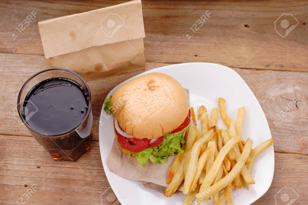 hamburger and french fries on wooden background - 64789865 hamburger and french fries on wooden background - 64789865