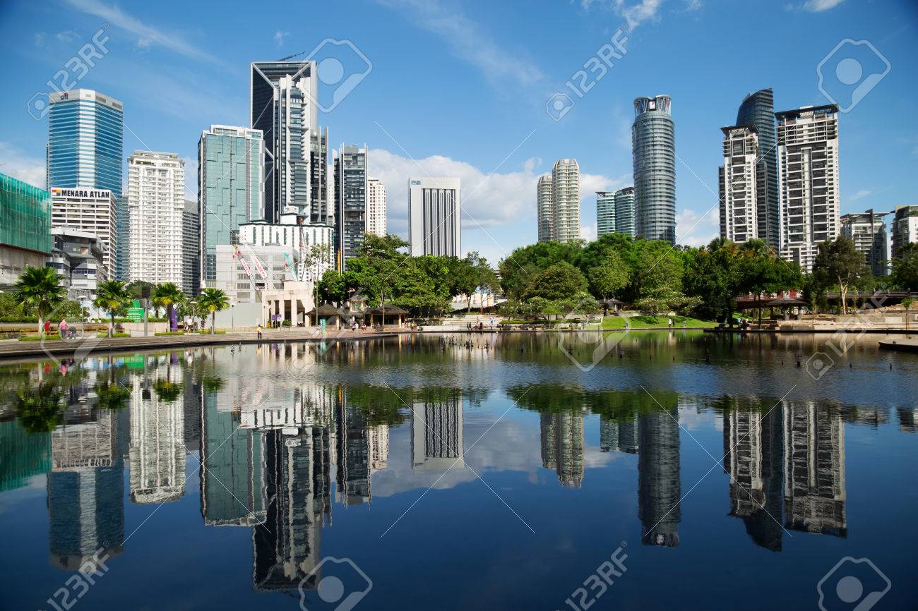 Kuala Lumpur, Malaysia - January 30, 2016: The KL City Centre Park in Kuala Lumpur, Malaysia. View on modern skyscrappers. - 54761686 Kuala Lumpur, Malaysia - January 30, 2016: The KL City Centre Park in Kuala Lumpur, Malaysia. View on modern skyscrappers. - 54761686