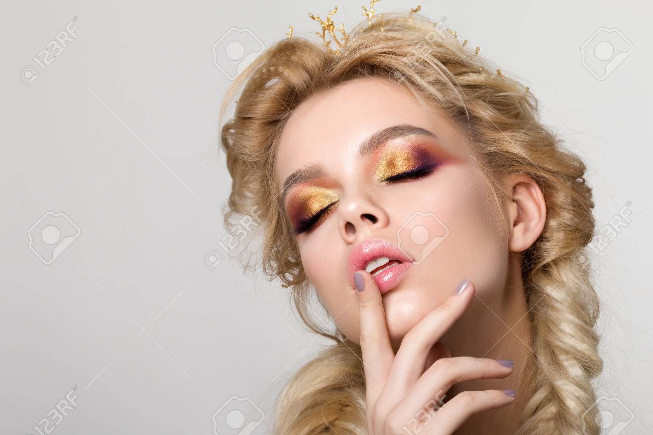 Portrait Of Young Beautiful Blonde Woman With Creative Make Up