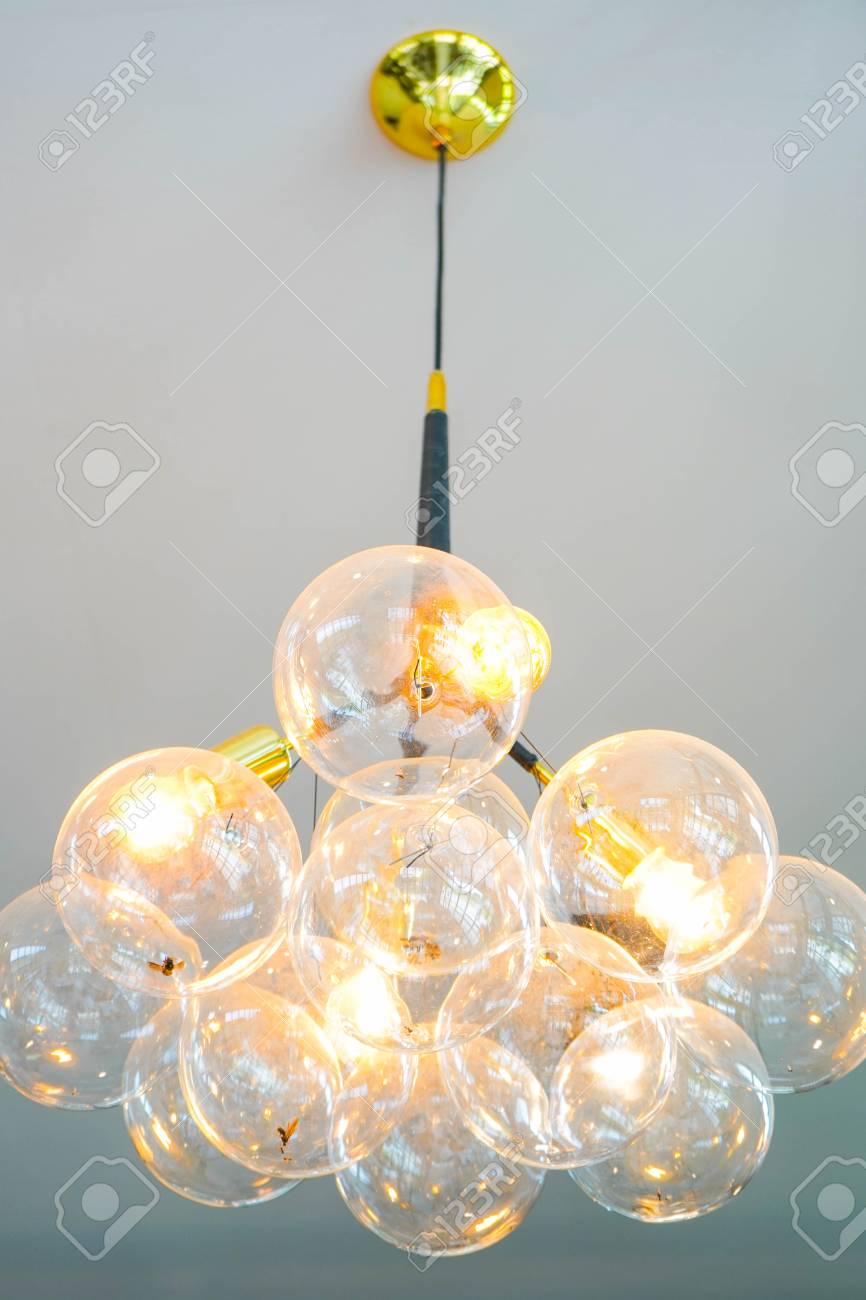 Modern Lamps Hanging On The Ceiling In Coffee Shop Lighting Stock