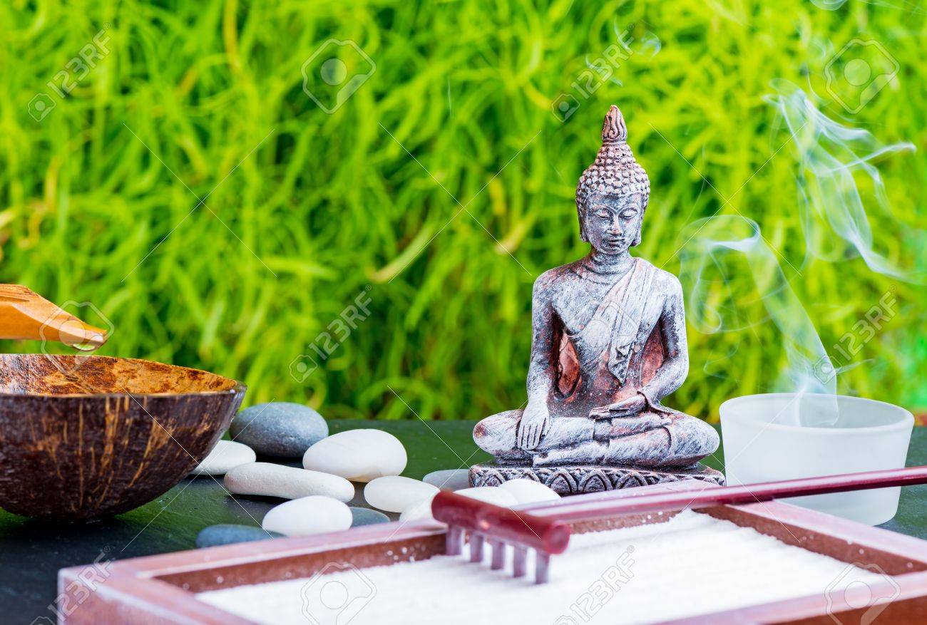 Zen Garden Background With Buddha Candle Rake Sand And Zen Stock Photo Picture And Royalty Free Image Image
