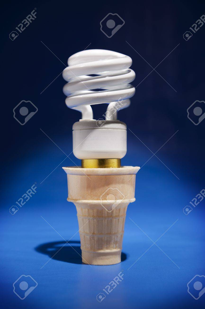 a compact flourescent light bulb sticks out of an ice cream cone