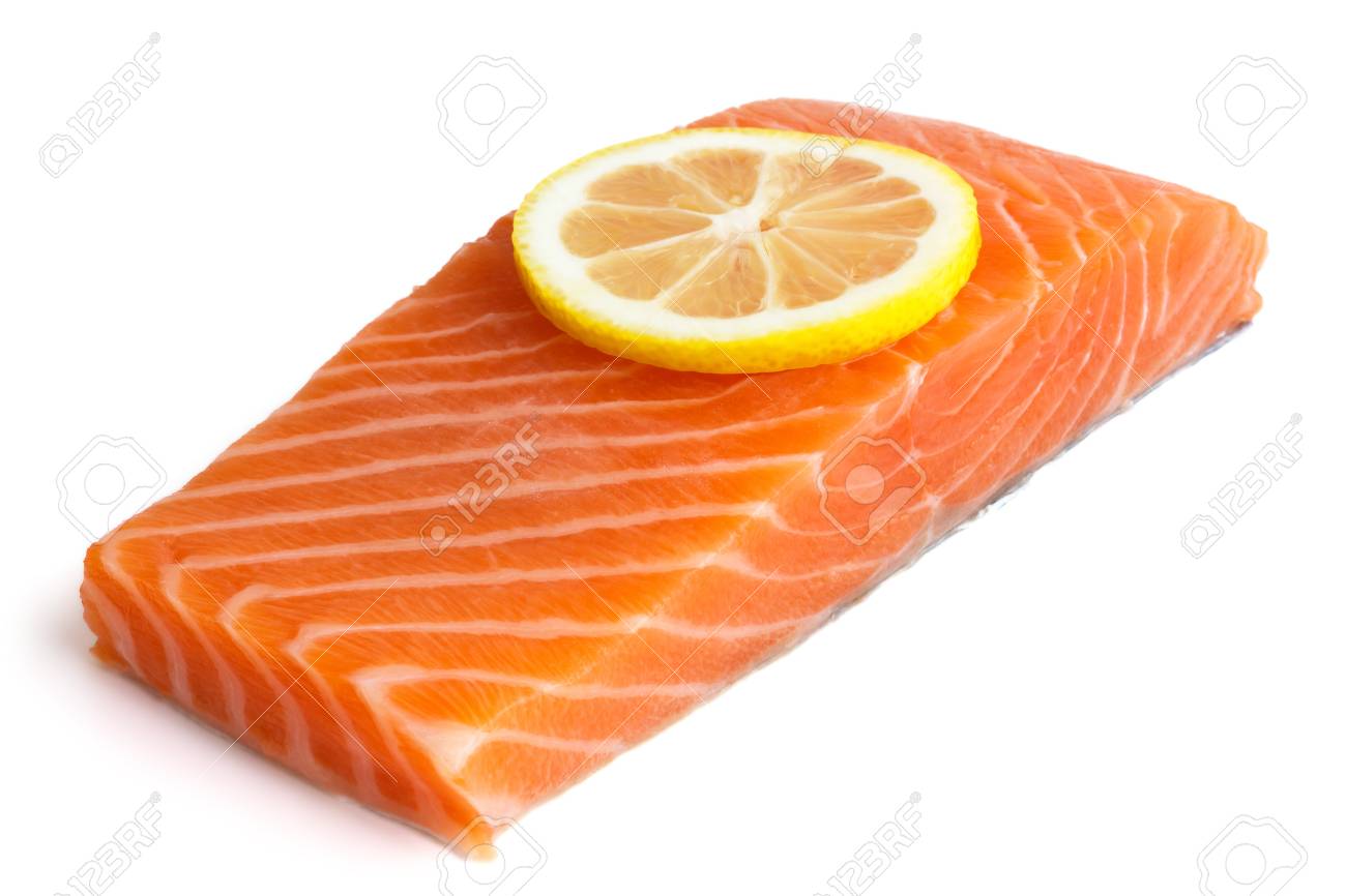 Raw Salmon Fillet On White. Lemon Slice. Stock Photo, Picture And Royalty  Free Image. Image 36150489.