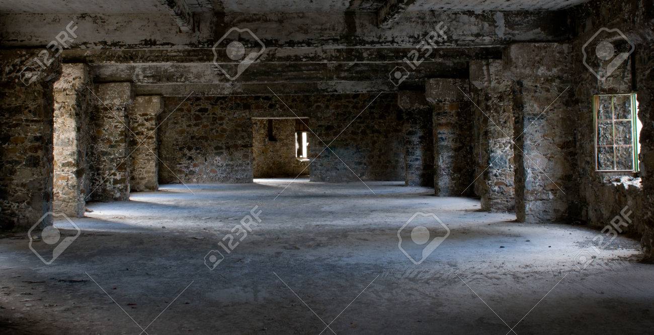 empty abandoned hotel interior room with broken windows and empty abandoned hotel interior room with broken windows and