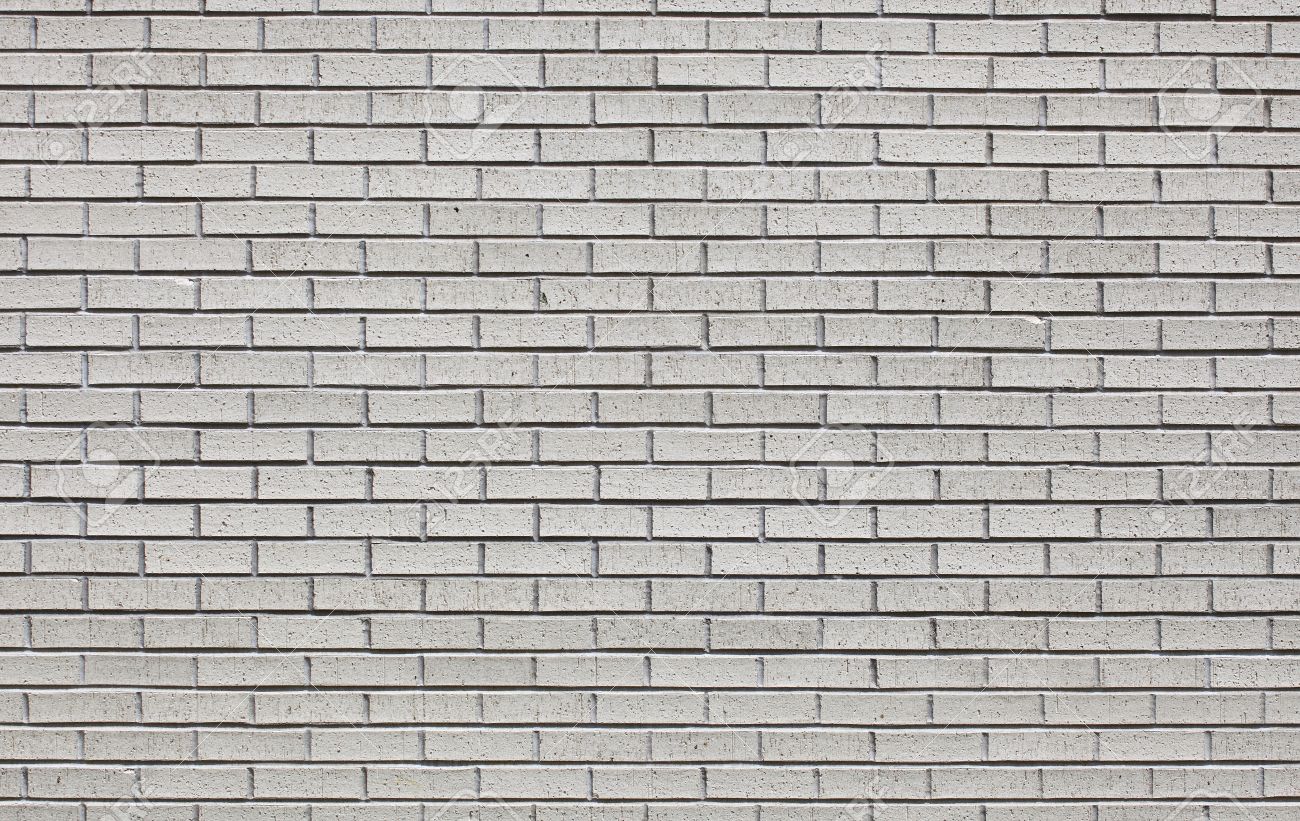 grey concrete wall texture as the block brick wall stock photo