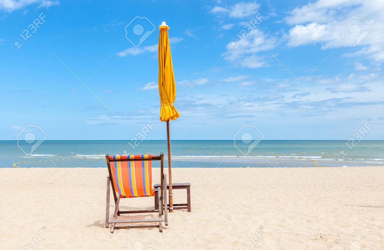 Lonely Beach Chair And Closed Sun Umbrella On Beautiful Beach Stock Photo Picture And Royalty Free Image Image 32084060