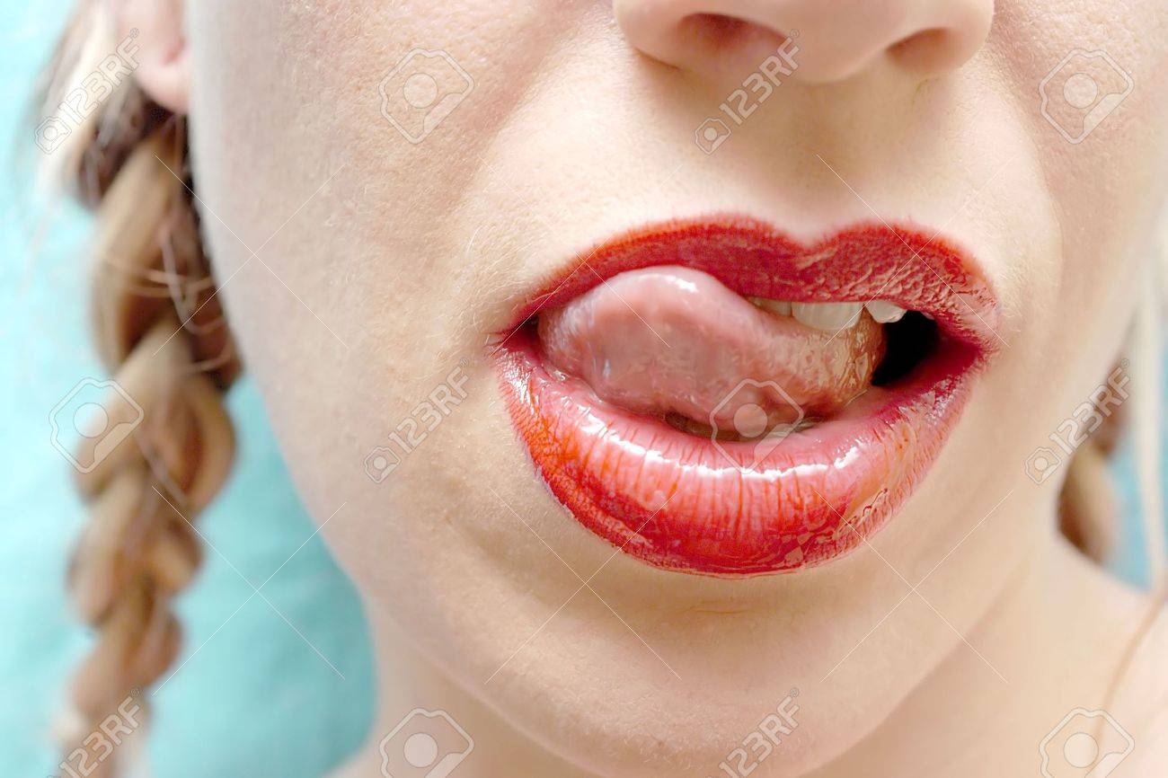 A Womans Sexy Red Lips Licking Her Lips Stock Photo 680210 A Womans Sexy Red Lips Licking Her Lips Stock Photo 680210