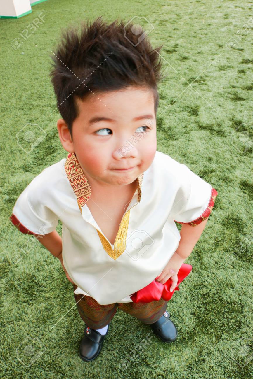 A Cute Boy In Thai Dress Stand On The Yard Stock Photo 72934070 A Cute Boy In Thai Dress Stand On The Yard Stock Photo 72934070