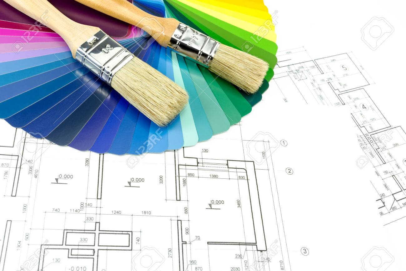 Paintbrushes And Colorful Paint Samples On House Plan Blueprint