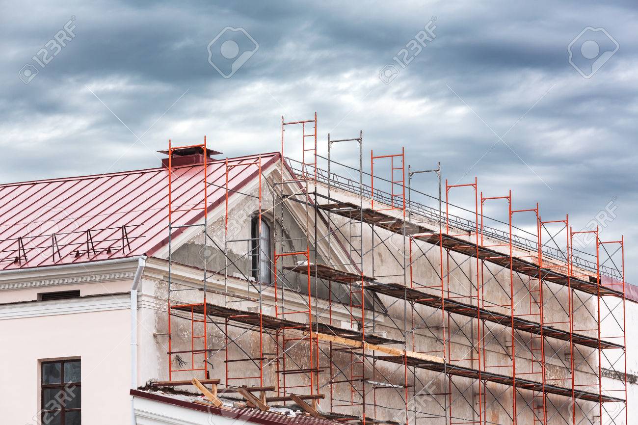 scaffold surrounding old building during renovation works stock the scaffold works