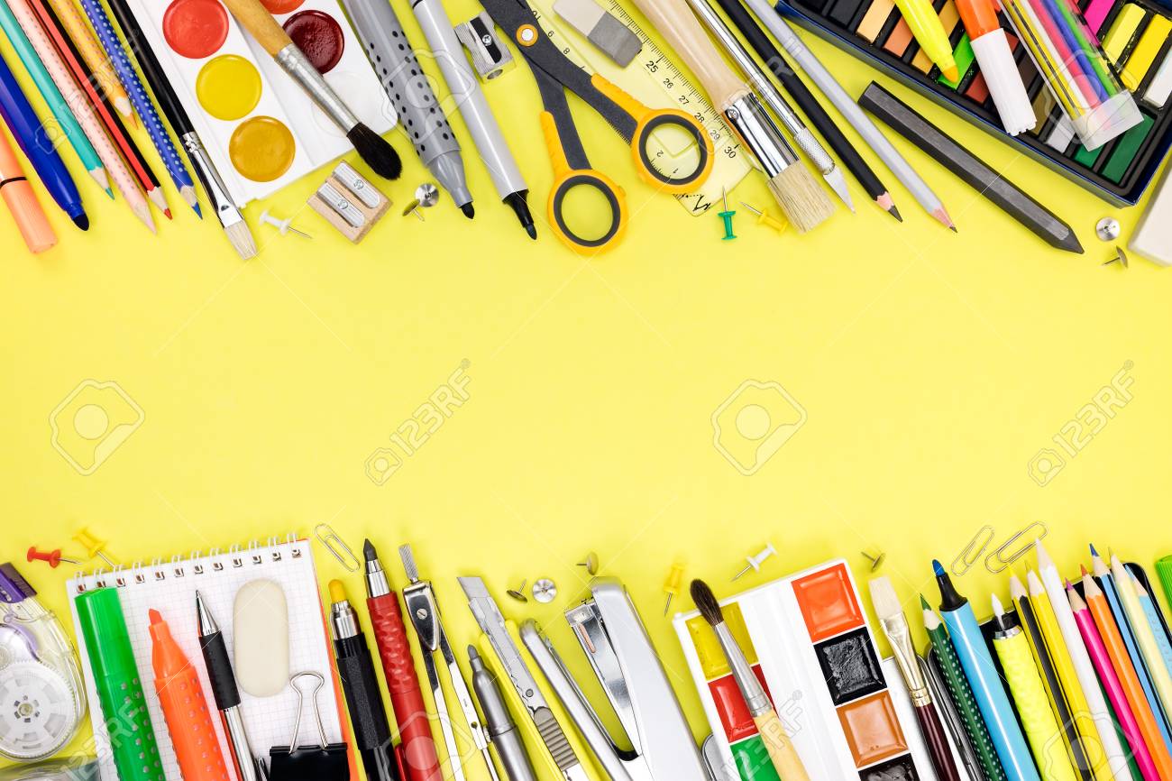 school and office supplies for studies on yellow table background office supplies background