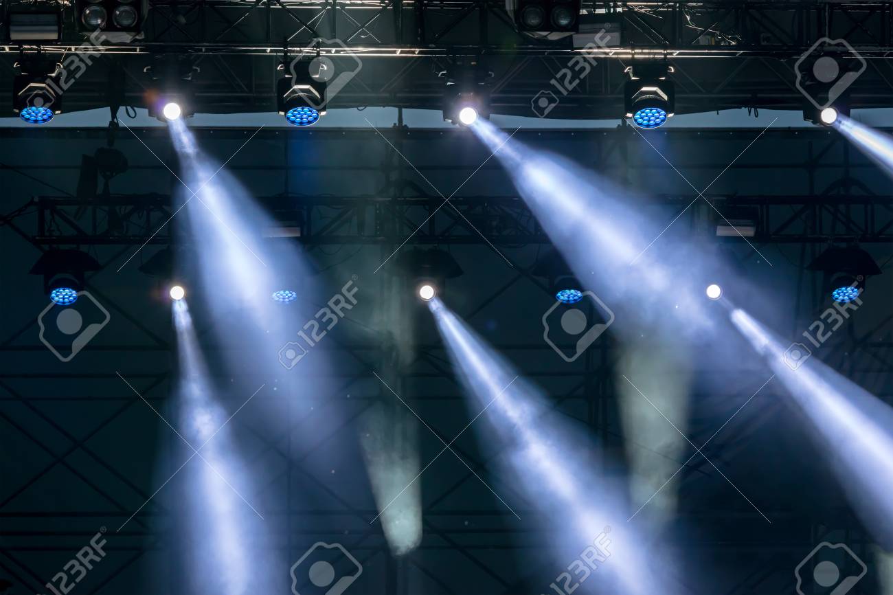 Blue Stage Lights Spotlight Equipment At Outdoor Concert