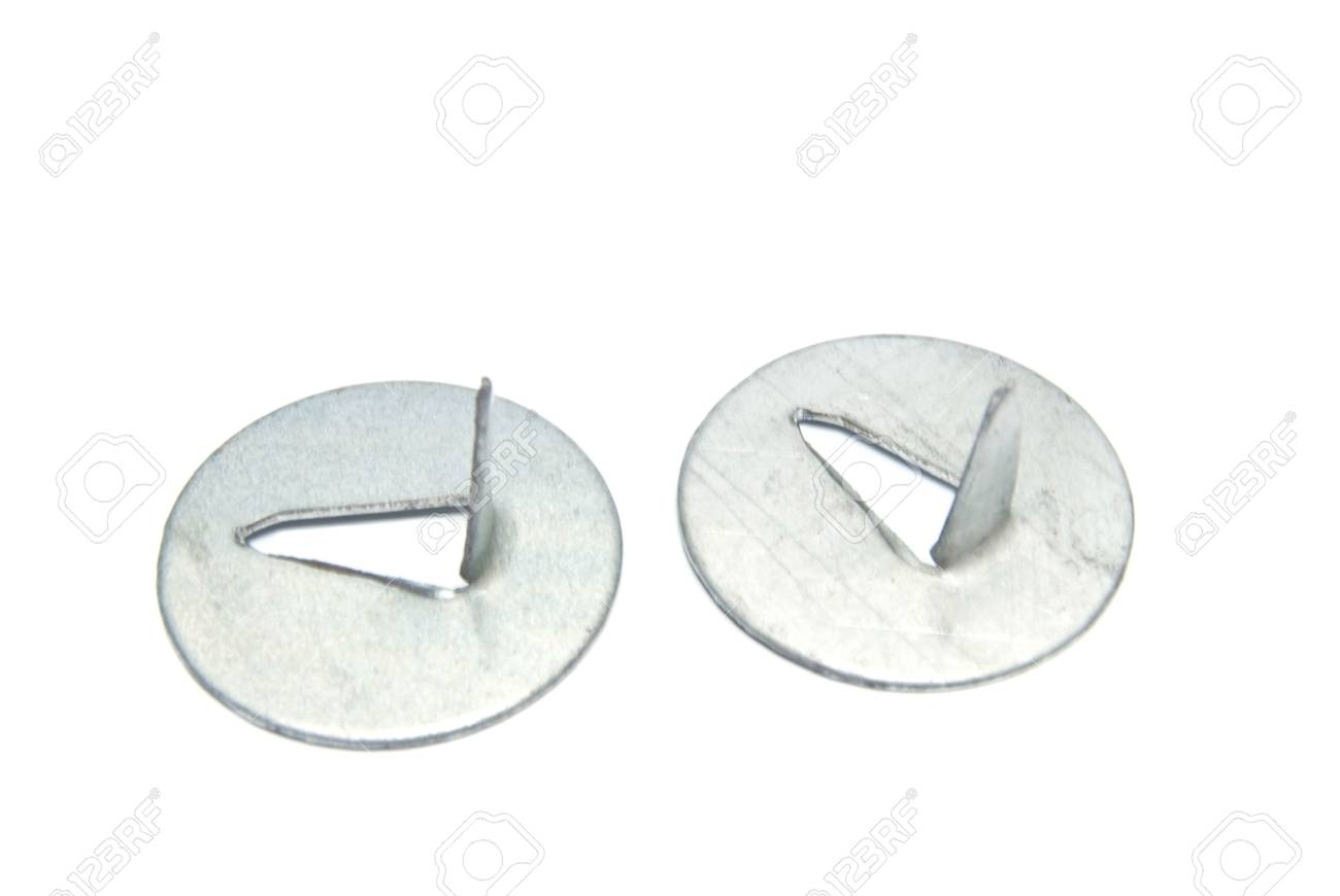 two silver color push pins close up on white background stock photo silver push pins