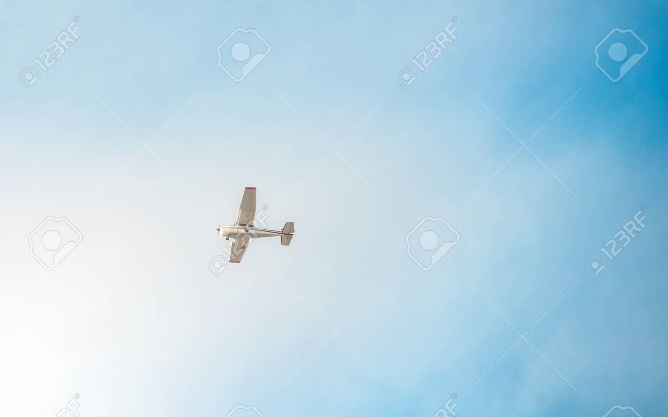 Flying Small Plane In The Sky Stock Photo Picture And Royalty Free Image Image 72810444
