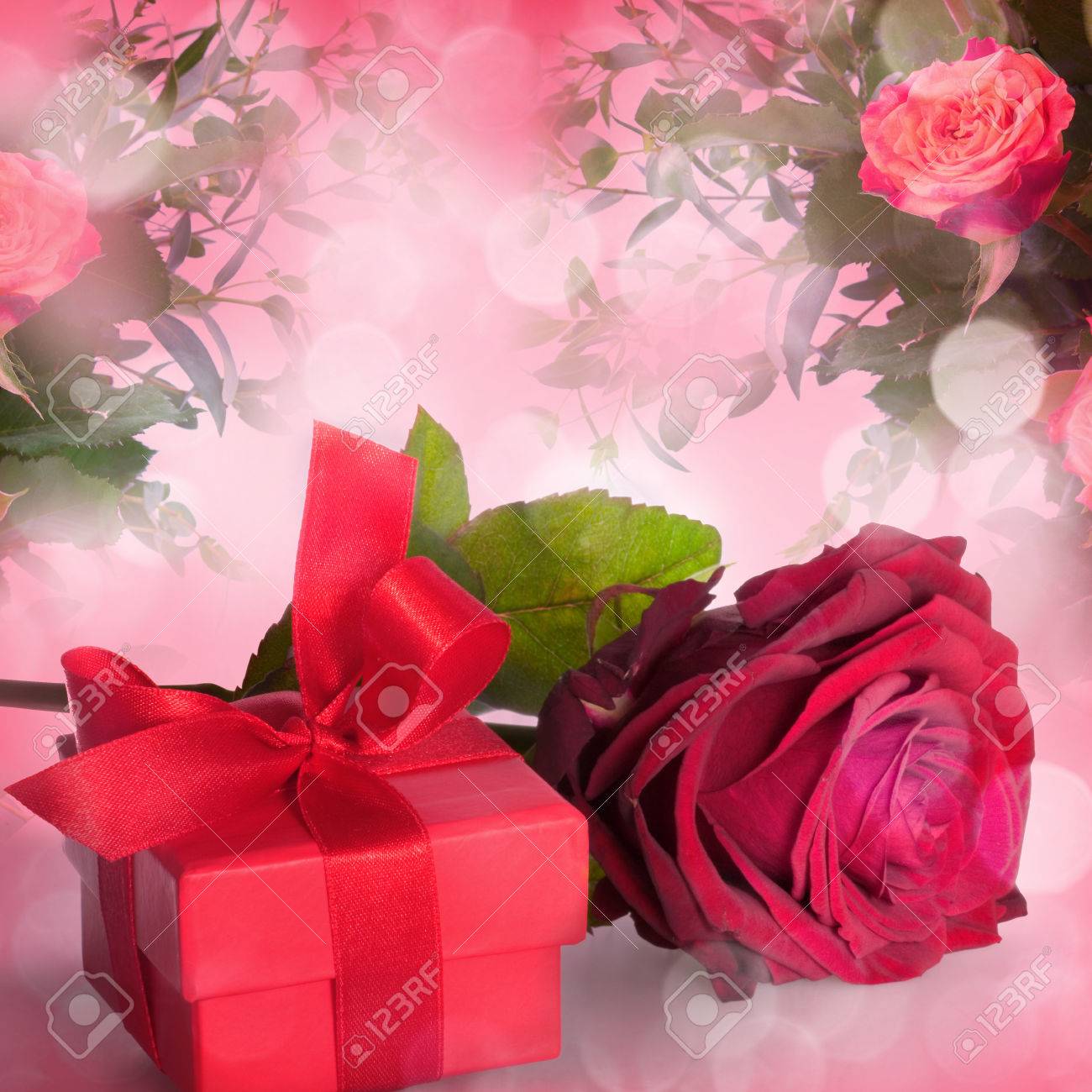 Bouquet of roses and gift box on romantic background - 43347477 Bouquet of roses and gift box on romantic background - 43347477