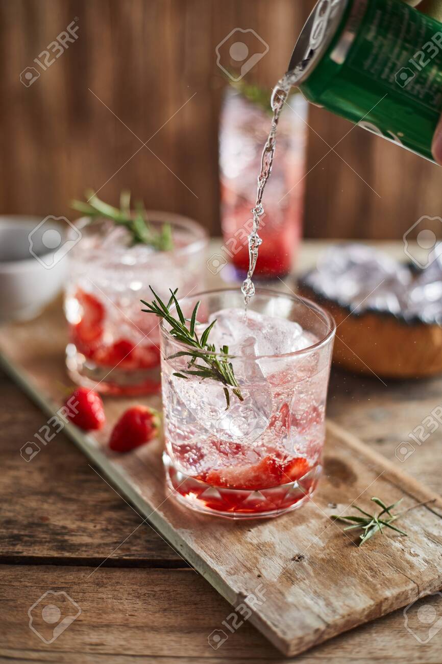 Holiday cold sparkling drink for party with ripe strawberry. - 137361113 Holiday cold sparkling drink for party with ripe strawberry. - 137361113