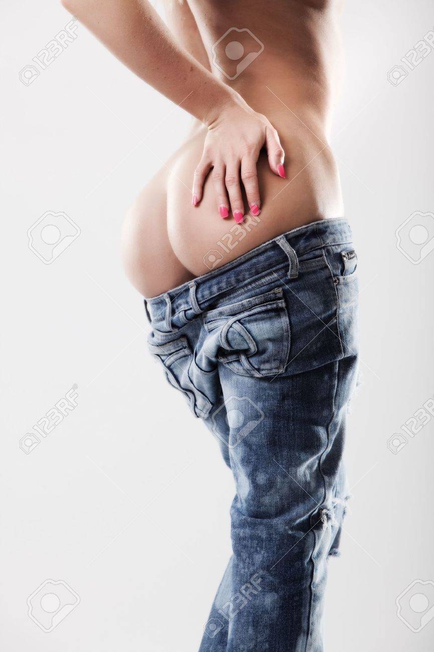 Bare Butt Of Young Woman Sticking From Blue Jeans Stock Photo, Picture and  Royalty Free Image. Image 6102101.