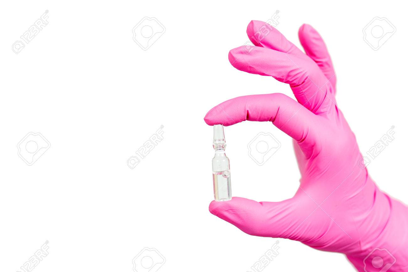 Hand Of Female Doctor In Pink Glove With Ampoule And Medicine Stock Photo Picture And Royalty Free Image Image