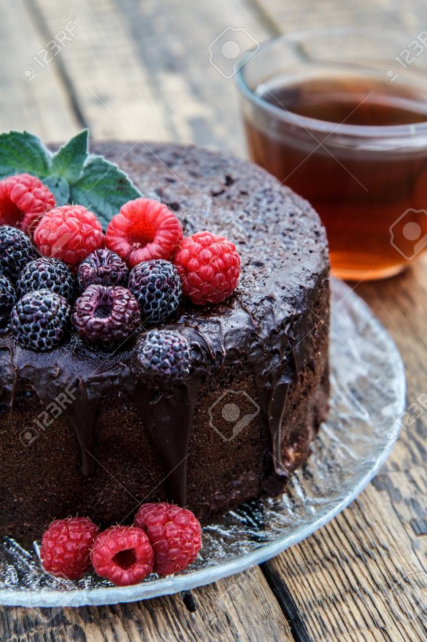 Homemade Chocolate Cake Decorated With Mint Leaves Black And