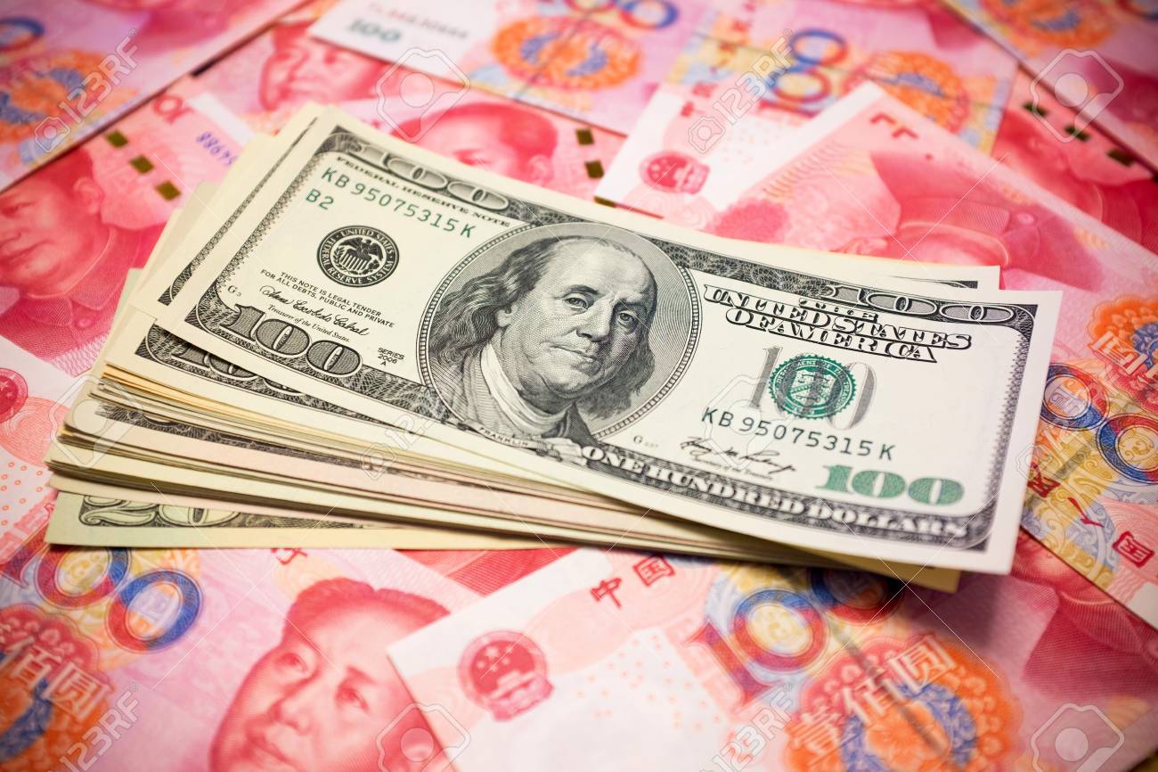 Chinese Yuan And US Dollar Background Exchange Rate Stock Photo, Picture  and Royalty Free Image. Image 77131861.
