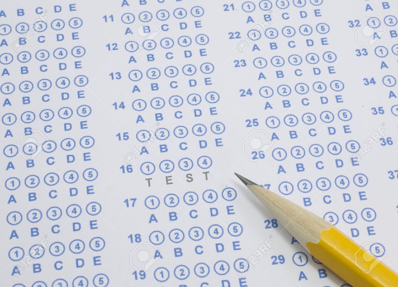 a blue bubble or scantron sheet with a number two yellow pencil free bubble sheet