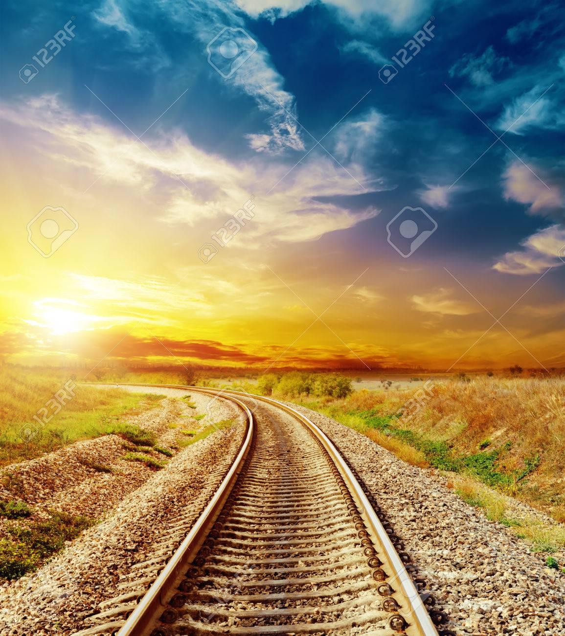 good sunset in colored sky over railroad - 31116838 good sunset in colored sky over railroad - 31116838