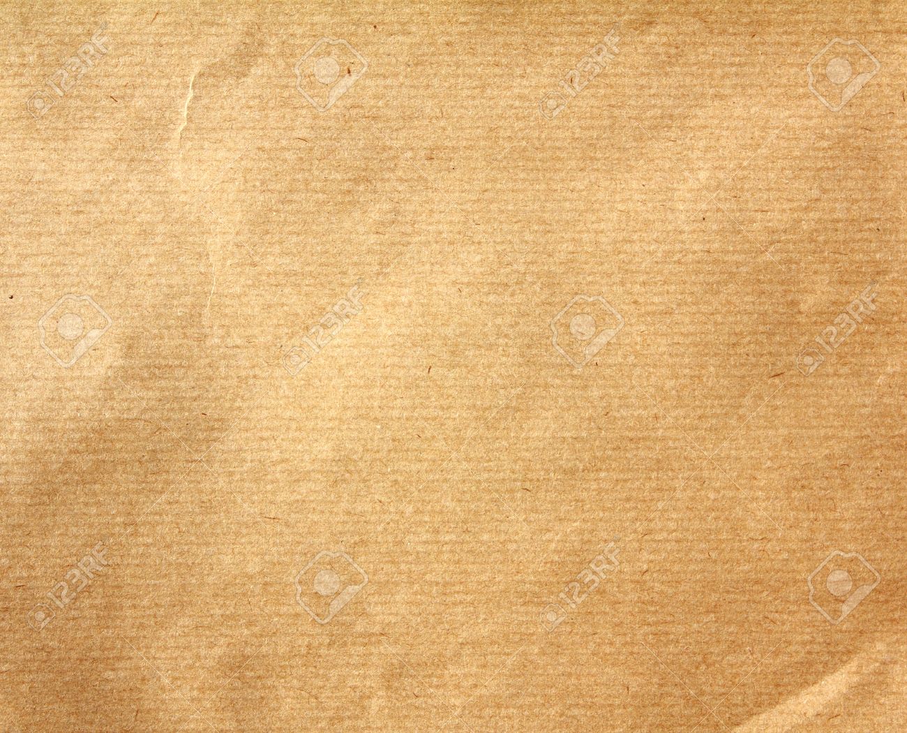 textured of obsolete packaging brown paper background stock photo