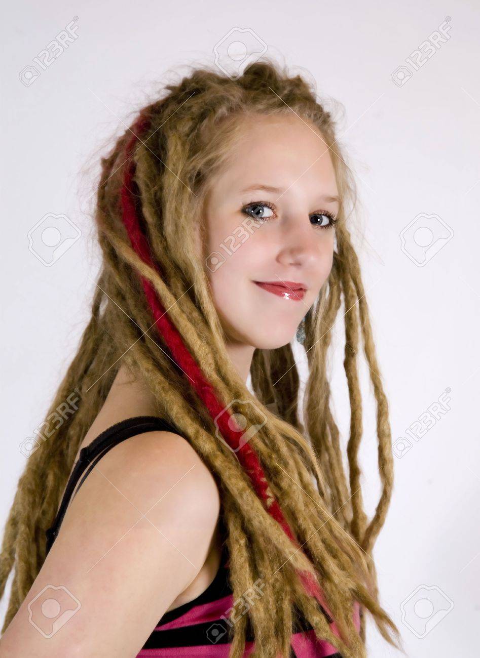 A Pretty Girl With Dreads Smiling At The Camera