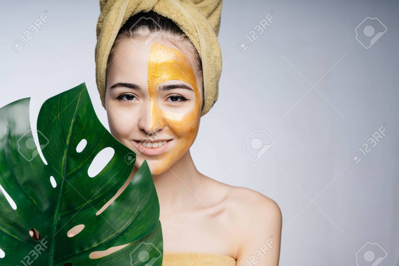 Download Asian Girl With A Yellow Mask On Half Of Her Face A Towel On Stock Photo Picture And Royalty Free Image Image 133772651 PSD Mockup Templates