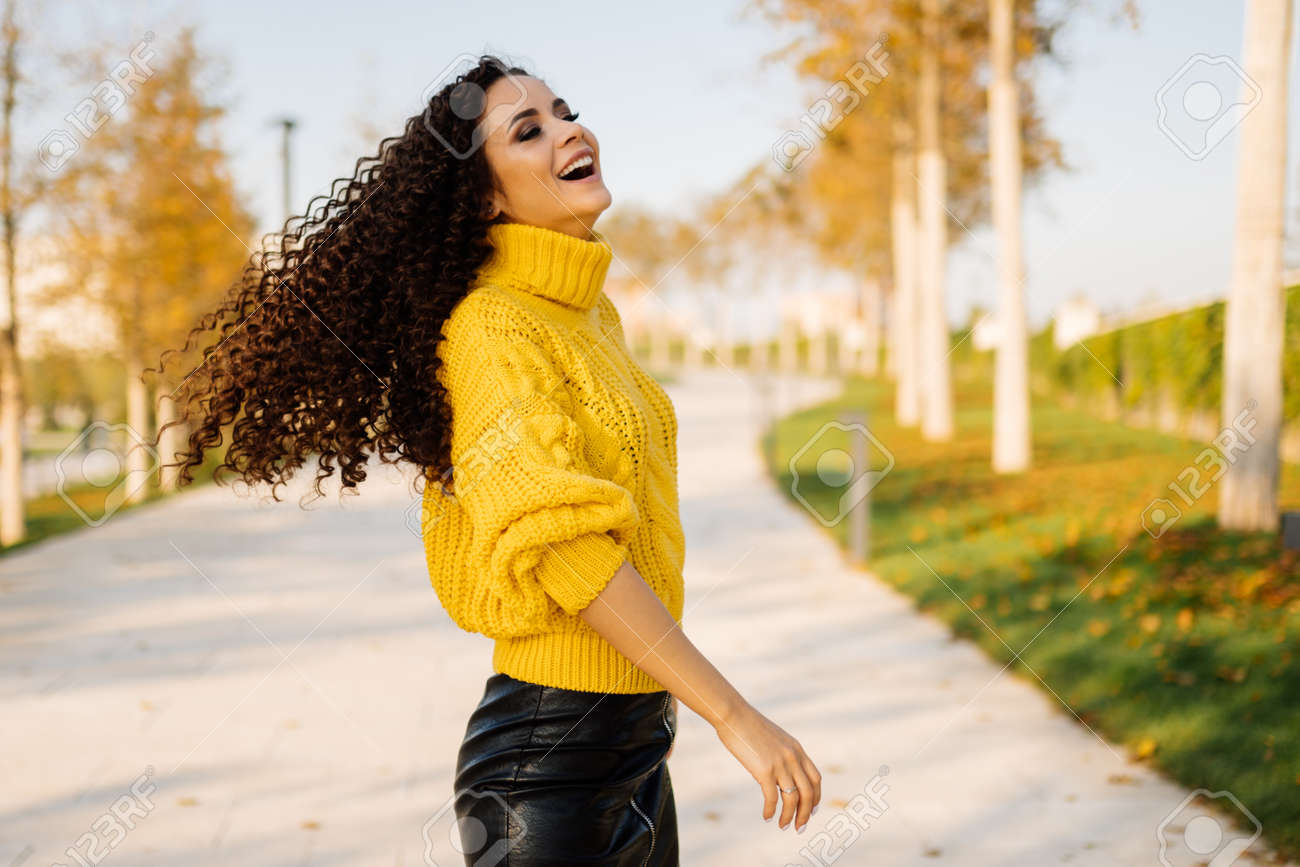 bright yellow sweater
