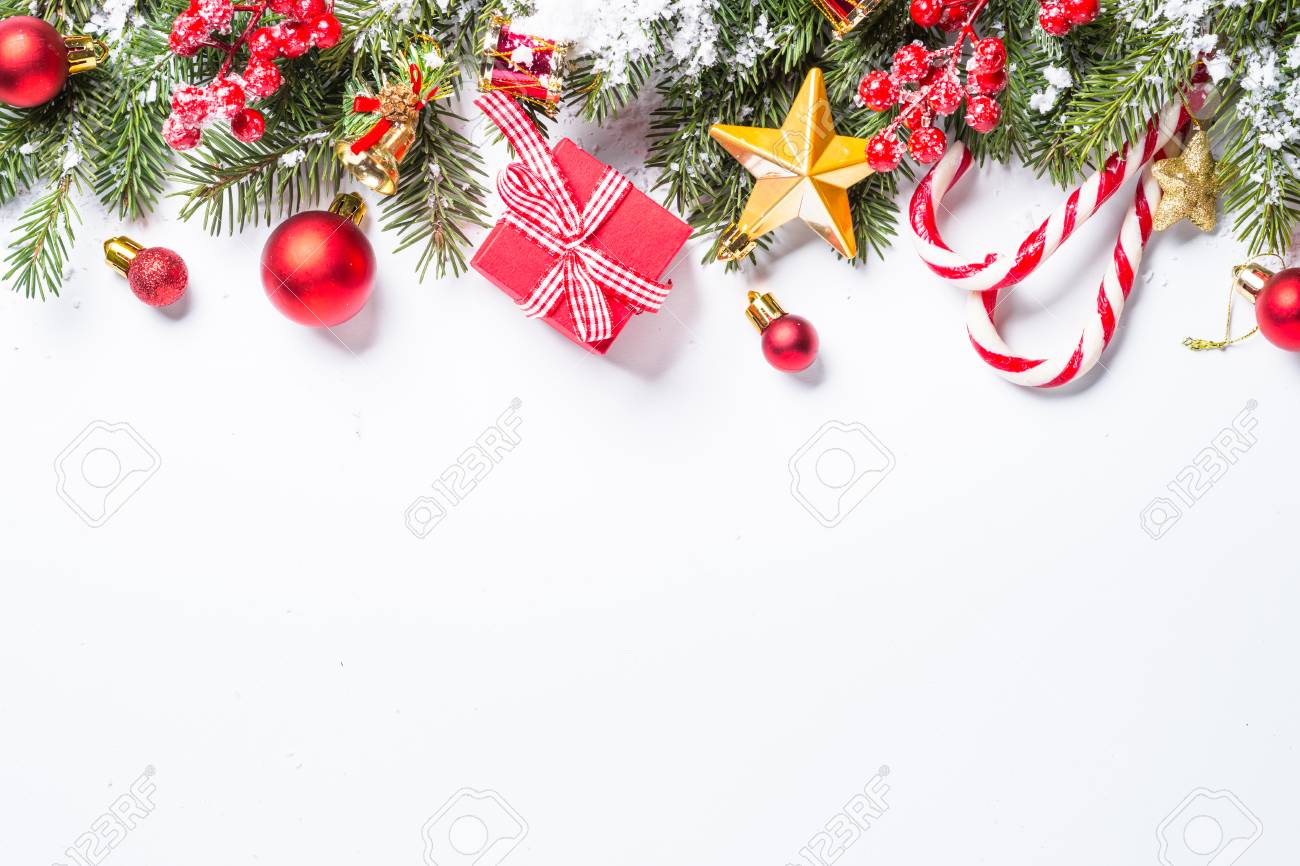 Christmas Background. Red And Gold Christmas Decorations With Snow Fir Tree  Branch On White Background Isolated. Top View With Copy Space. Stock Photo,  Picture and Royalty Free Image. Image 91588062., image size:1300x866