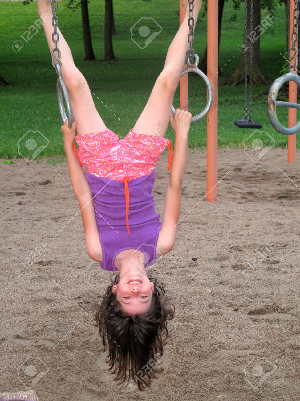 little girl hanged Young Girl Hanging Upside Down Stock Photo, Picture and Royalty Free Image.  Image 7416498.