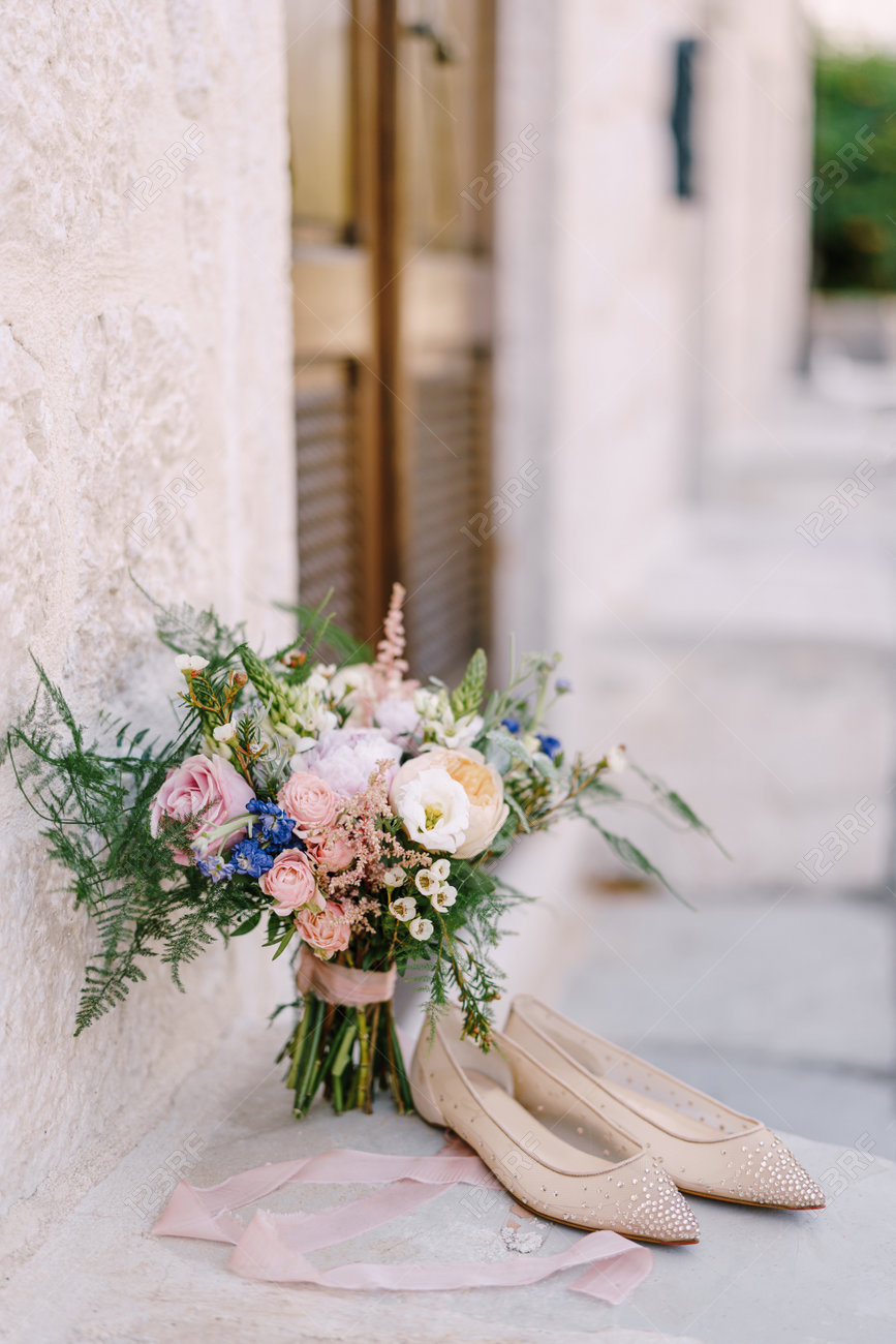 Bridal Bouquet Of Cream Roses Pink Peonies Eustoma Waxflower Stock Photo Picture And Royalty Free Image Image 151044396