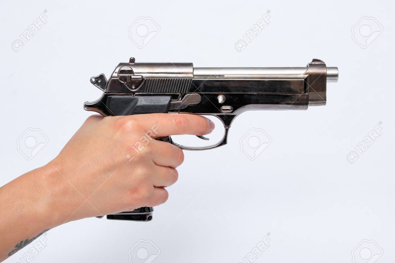 Woman Holding Gun In Hand Stock Photo Picture And Royalty Free