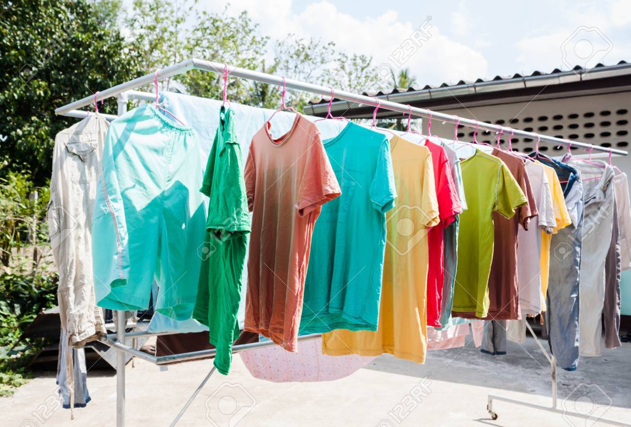 Laundry hanging out to dry outdoors in summer - 19580147 Laundry hanging out to dry outdoors in summer - 19580147