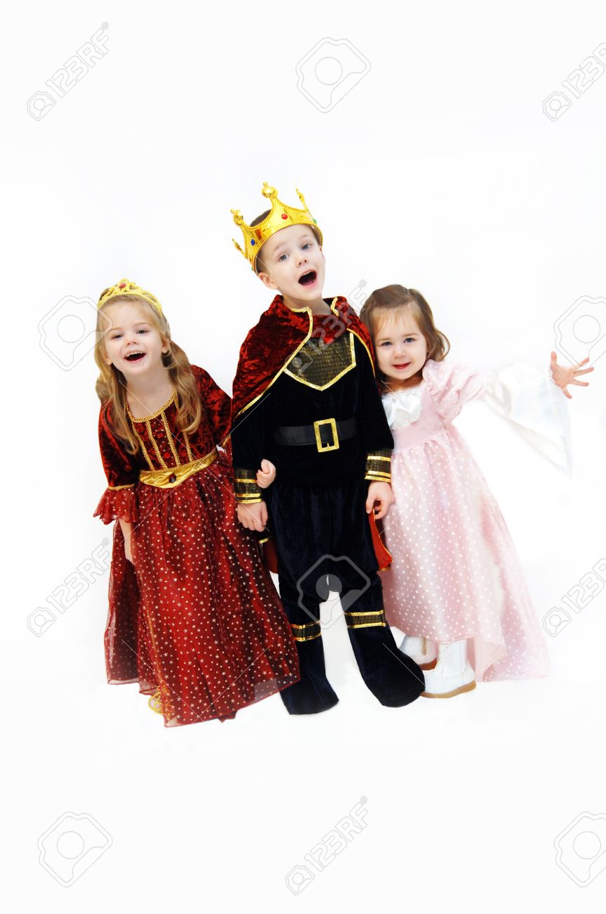 King, queen and princess are laughing and talking as they pose in their Halloween costumes. Children are wearing crowns, gowns and royal cape. - 15107593 King, queen and princess are laughing and talking as they pose in their Halloween costumes. Children are wearing crowns, gowns and royal cape. - 15107593