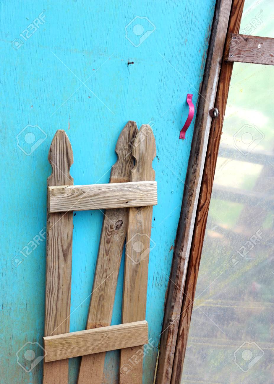 Greenhouse Door Has Wooden Picket Fence Attached Door Is Painted Stock Photo Picture And Royalty Free Image Image