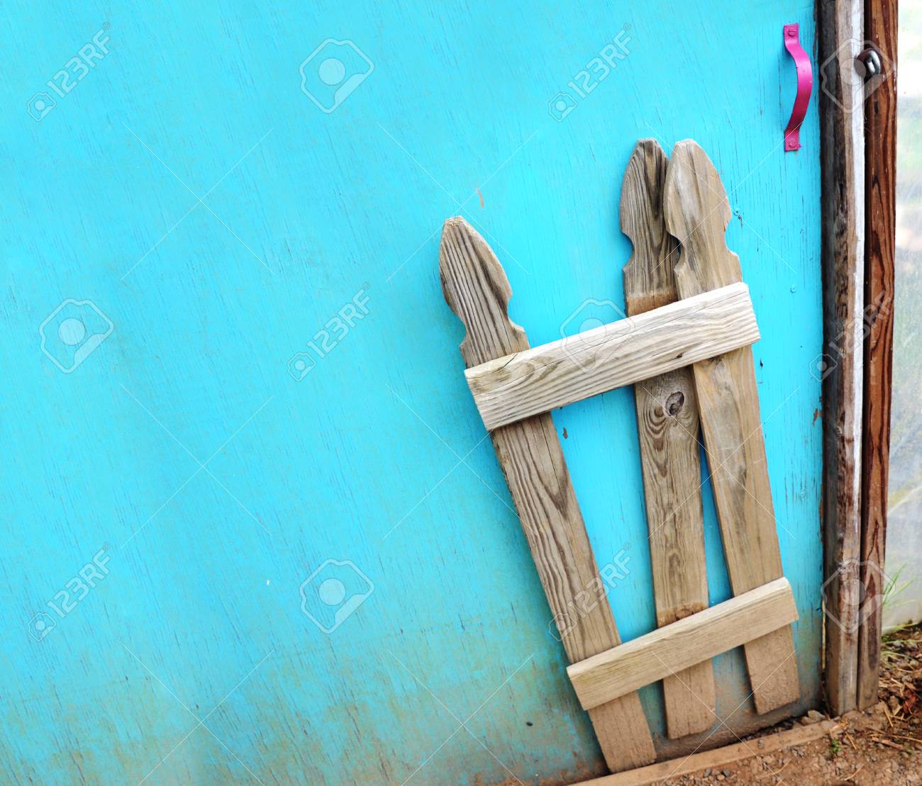 Greenhouse Door Is Painted A Bright Torquoise Handle Is Pink Stock Photo Picture And Royalty Free Image Image